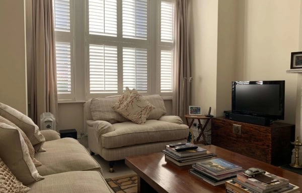 Should I Hang Curtains Over my Plantation Shutters? | Best Agencies